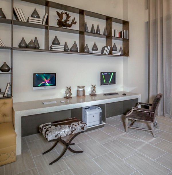 Elegant clubhouse featuring modern design and cozy seating at The Millennium Six Pines Apartments