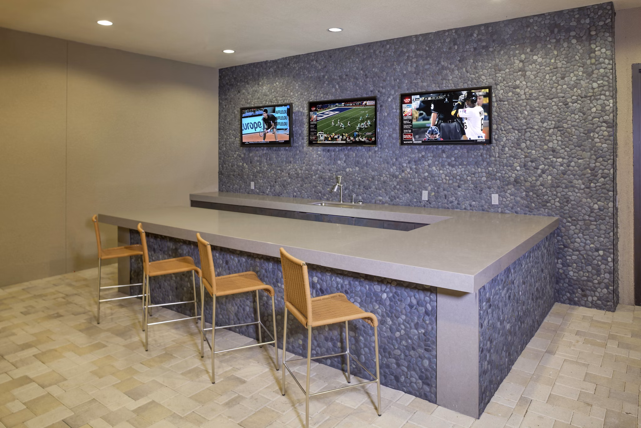 Inviting clubhouse with modern decor at The Millennium Six Pines Apartments