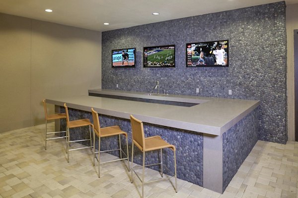 Inviting clubhouse with modern decor at The Millennium Six Pines Apartments