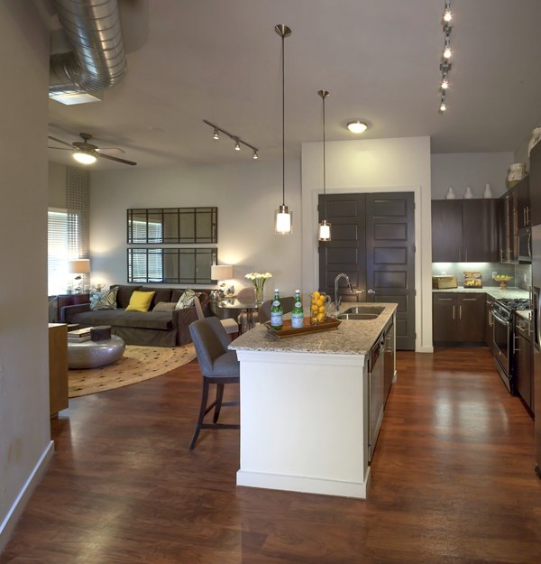 Luxurious bedroom with modern decor and ample natural light in The Millennium Six Pines Apartments