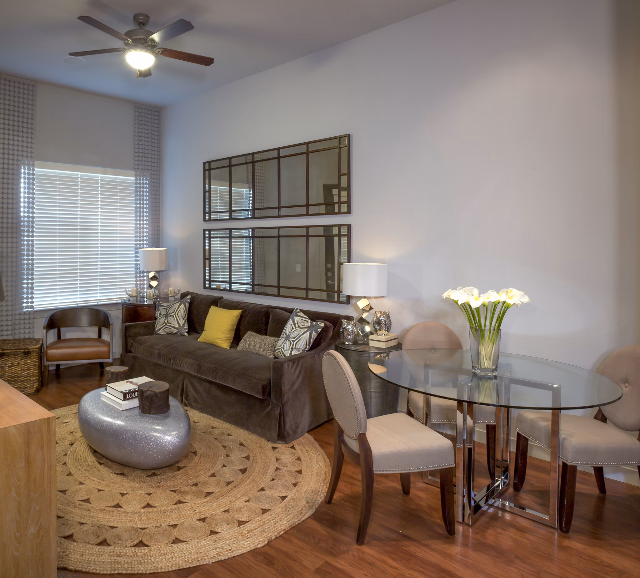 Spacious living room with modern dÃ©cor at The Millennium Six Pines Apartments