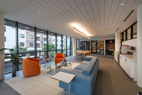 Clubhouse featuring modern design and comfortable seating at The Lane at Waterway Apartments