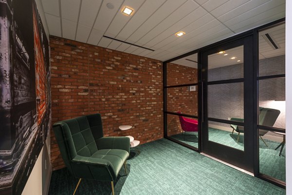 Modern clubhouse featuring sleek design at The Lane at Waterway Apartments