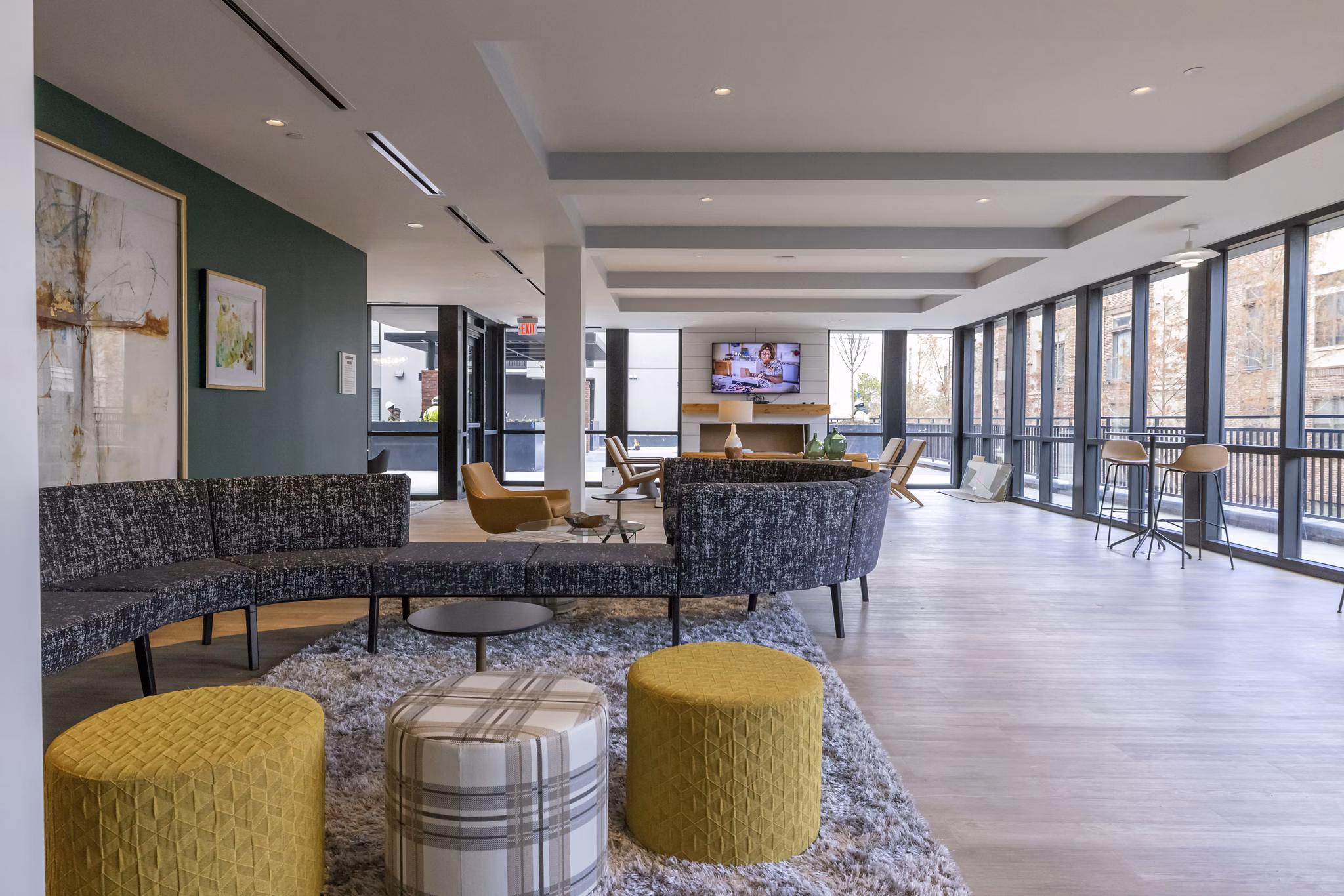 Clubhouse with modern design at The Lane at Waterway Apartments featuring social spaces and games