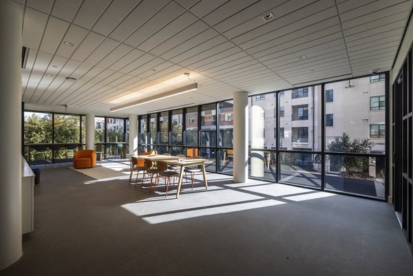 Clubhouse with stylish seating and modern decor at The Lane at Waterway Apartments