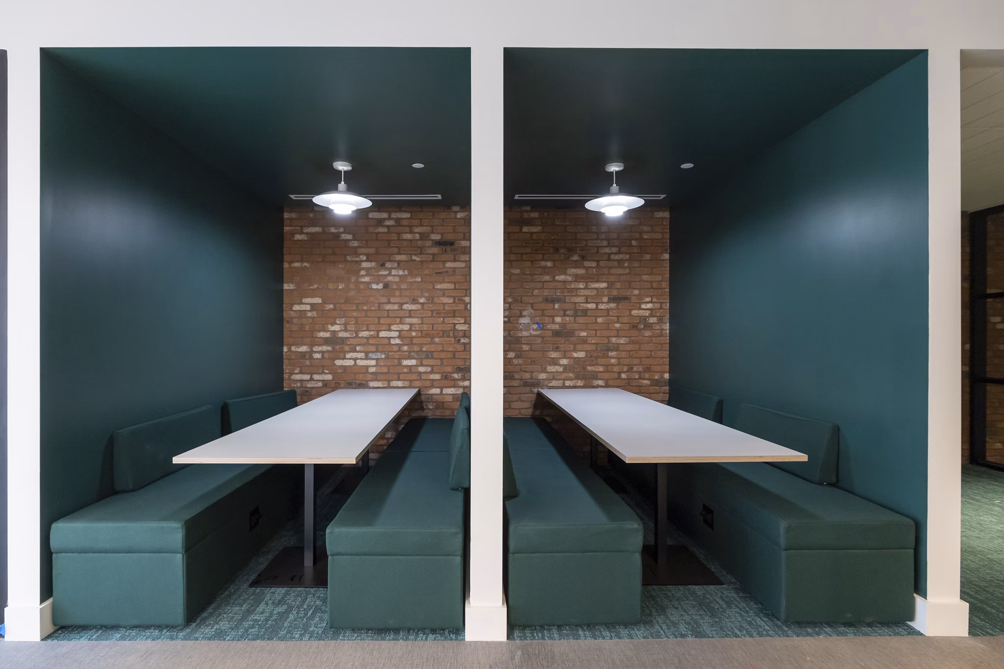 Stylish clubhouse with modern design at The Lane at Waterway Apartments, featuring comfortable seating and communal spaces