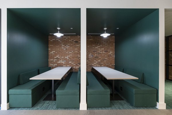 Stylish clubhouse with modern design at The Lane at Waterway Apartments, featuring comfortable seating and communal spaces
