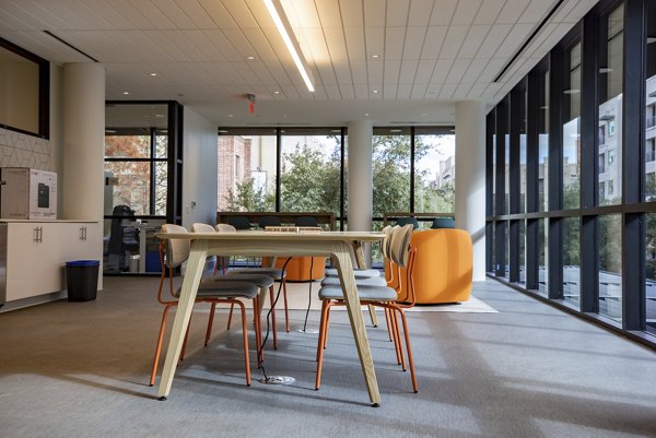 Modern clubhouse featuring luxury amenities at The Lane at Waterway Apartments, perfect for social gatherings and relaxation