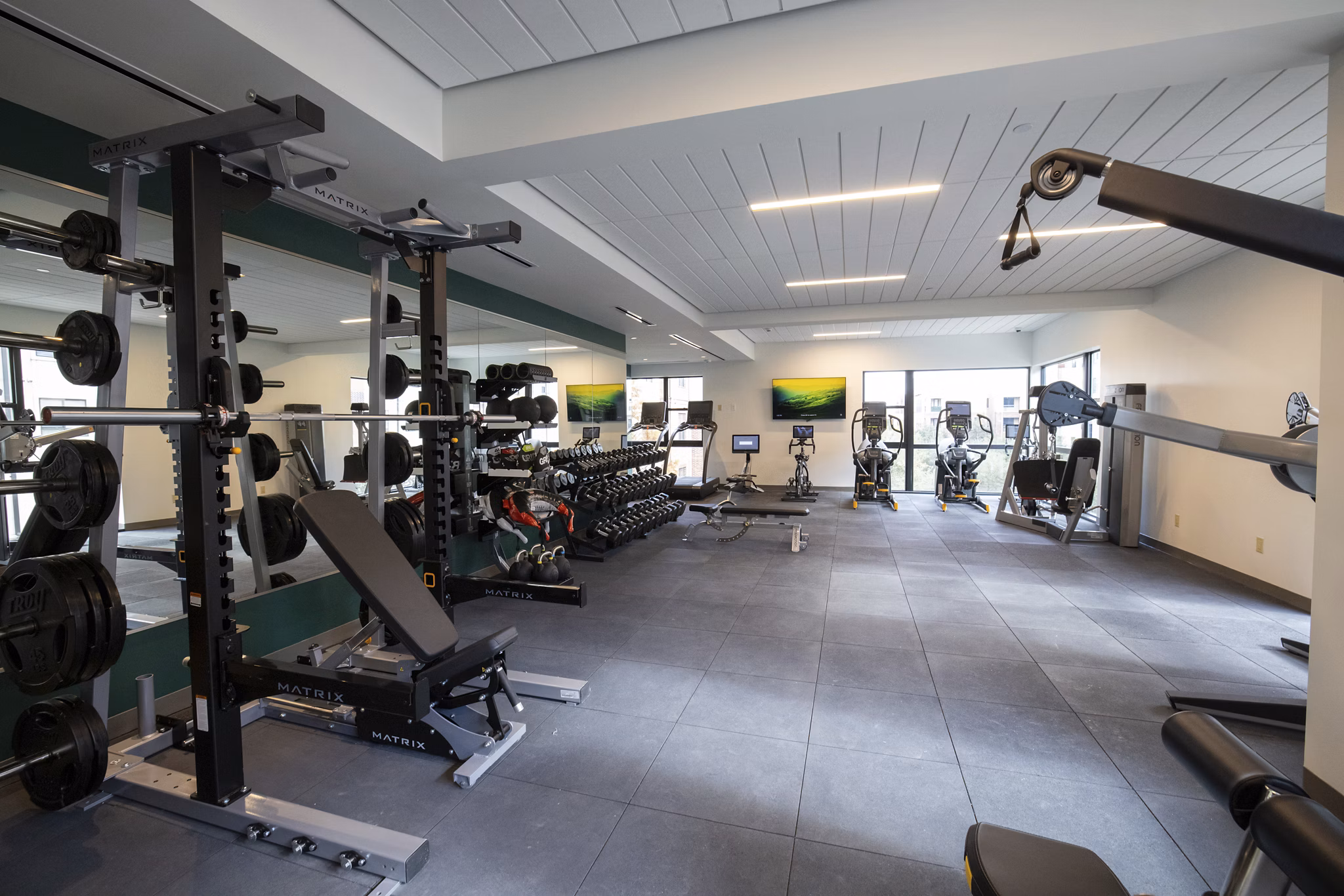 Fitness equipment at The Lane at Waterway Apartments' luxury gym