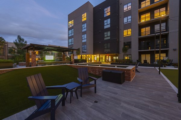 Courtyard with lush landscaping at The Lane at Waterway Apartments