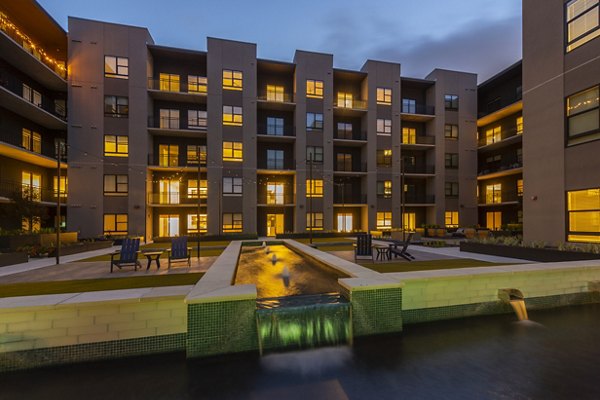 Courtyard with lush landscaping at The Lane at Waterway luxury apartments