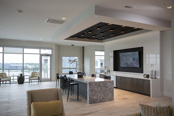 Clubhouse featuring modern design and open seating at Two Lakes Edge Apartments