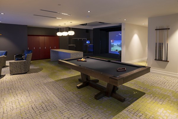 Elegant clubhouse with modern amenities at Two Lakes Edge Apartments, perfect for social gatherings and events in a luxury setting