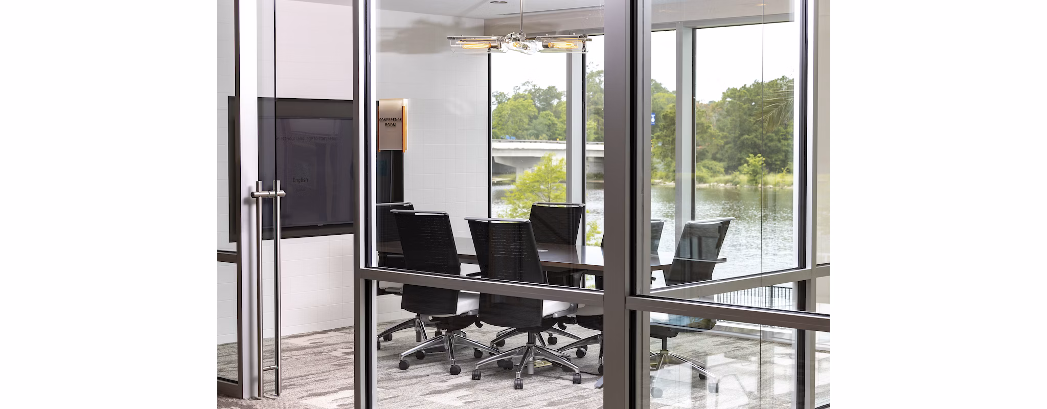 State-of-the-art meeting facility with modern decor at Two Lakes Edge Apartments designed for business and community gatherings