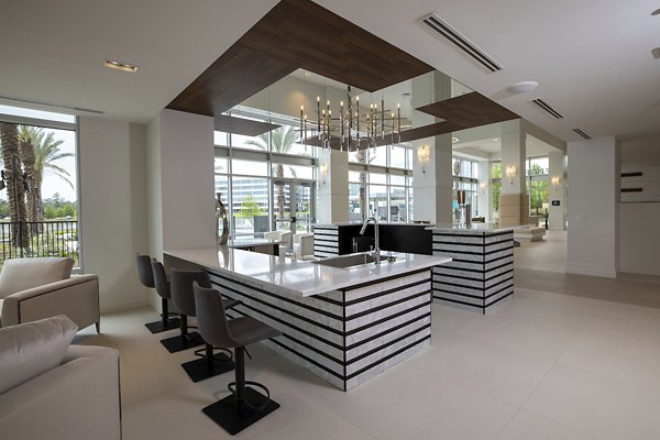 Clubhouse featuring modern design and open spaces at Two Lakes Edge Apartments
