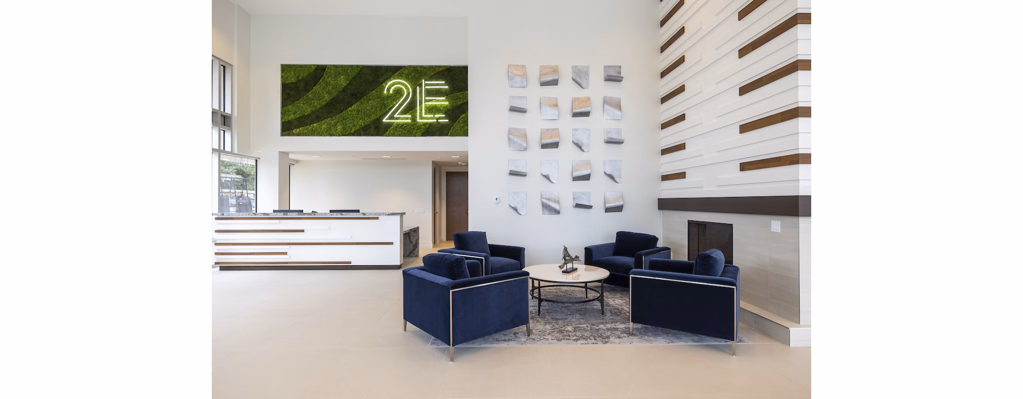 Clubhouse featuring modern design and spacious seating at Two Lakes Edge Apartments
