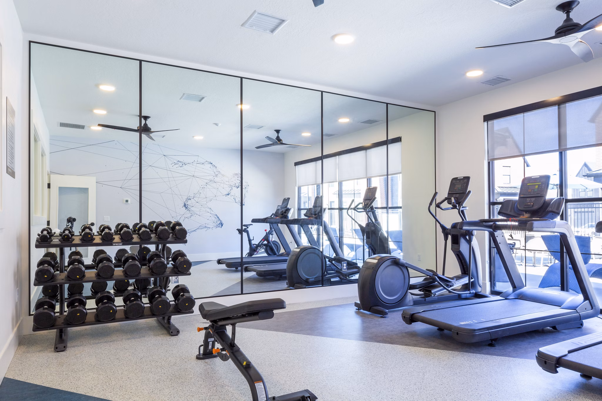 fitness center at Drexler Townhomes at Holbrook Farms Apartments