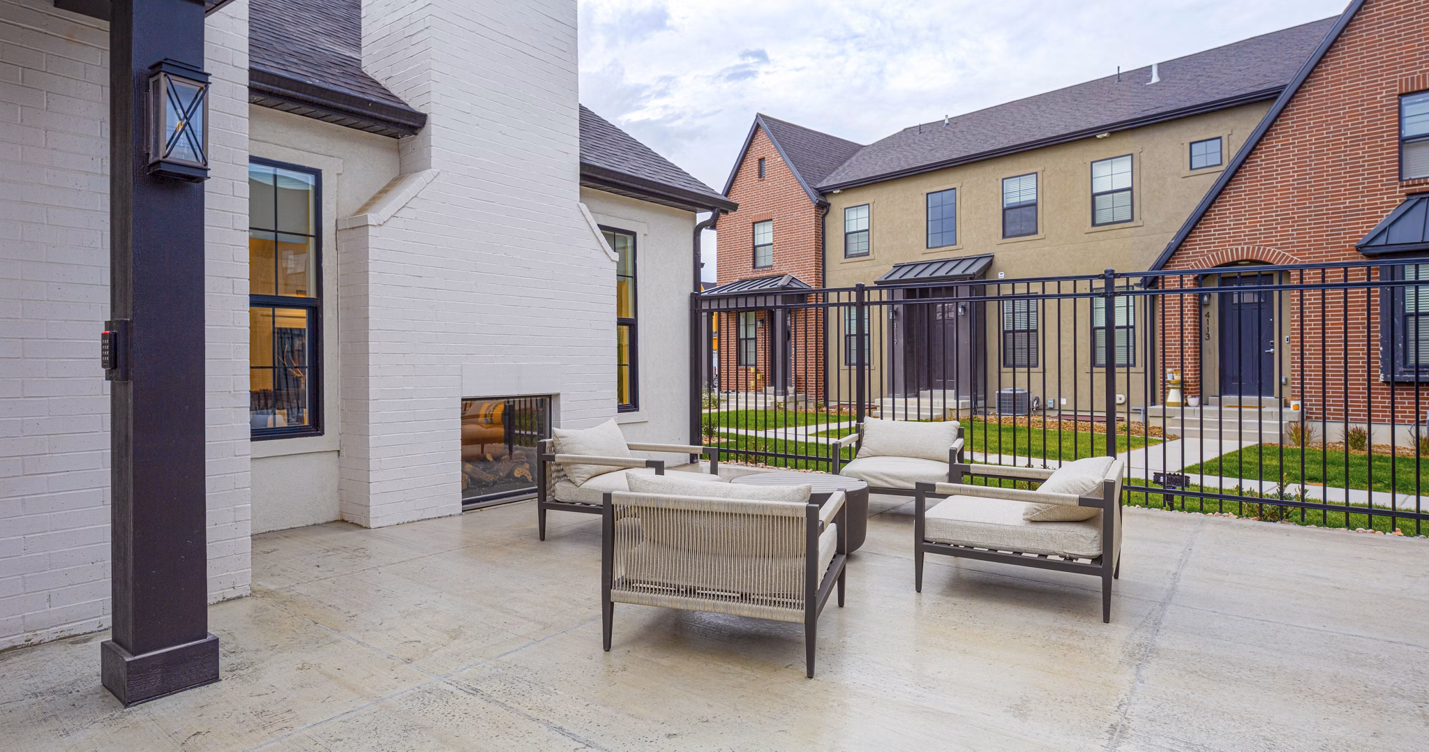 fire pit/patio at Drexler Townhomes at Holbrook Farms Apartments