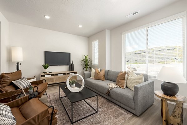 Modern living room with cozy furniture at Black Ridge Cove Apartments