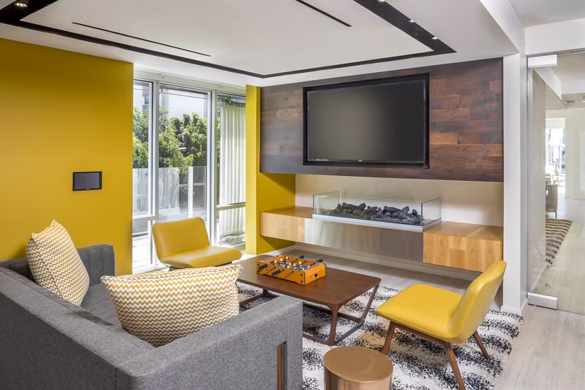 mResidences Olympic & Olive: Elegant clubhouse with modern seating and ambient lighting for relaxation and social gatherings