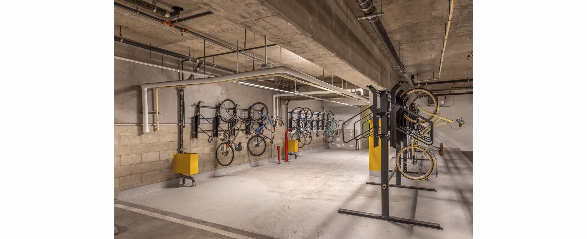 Secure bike storage facility at mResidences Olympic & Olive Apartments