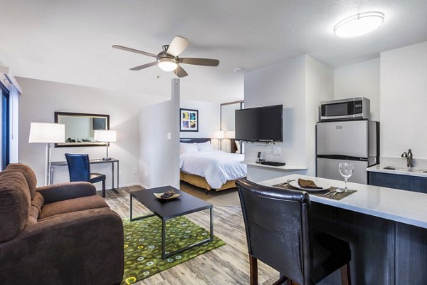 Modern kitchen featuring stainless steel appliances in mResidences Silicon Valley Apartments