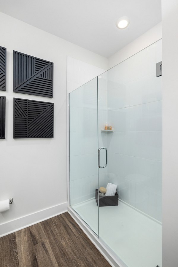 Modern bathroom with sleek fixtures at Wentworth Park Apartments offering luxury living in a Greystar community