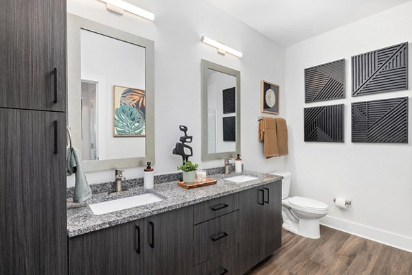 Spacious bathroom featuring modern fixtures at Wentworth Park Apartments
