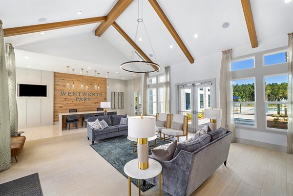 Clubhouse featuring modern design and spacious seating at Wentworth Park Apartments Perfect for community gatherings and social events