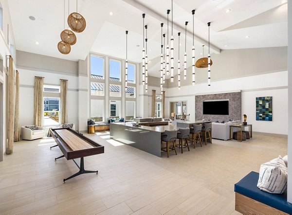 Modern fitness center with state-of-the-art equipment at Wentworth Park Apartments clubhouse