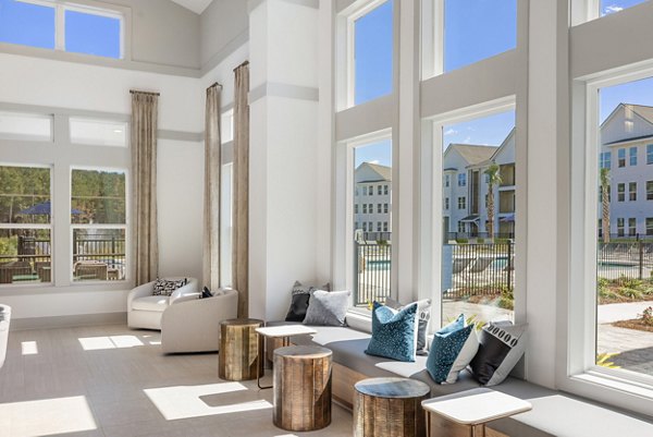 Clubhouse featuring modern design and comfortable seating at Wentworth Park Apartments
