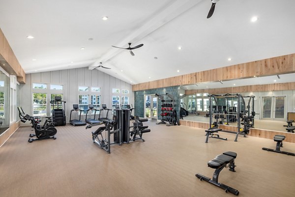 Modern fitness center with state-of-the-art equipment at Wentworth Park Apartments