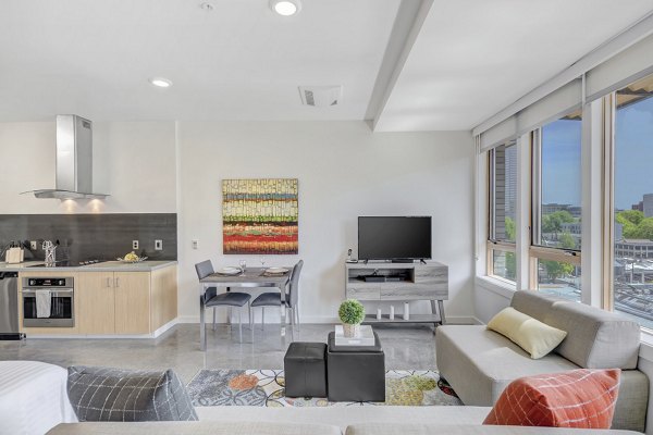 Spacious living room with modern decor in mResidences Portland Pearl District Apartments