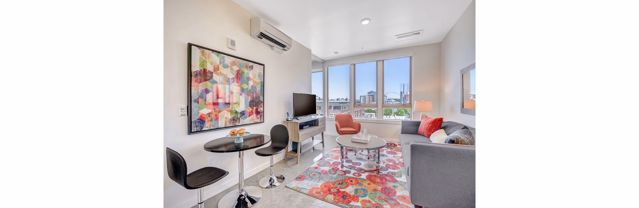 Spacious living room with modern decor in mResidences Portland Pearl District Apartments