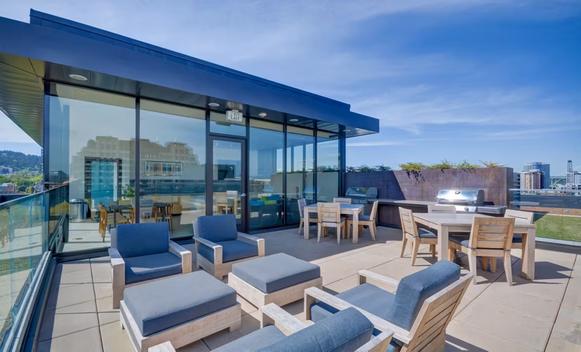 Rooftop deck with city view at mResidences Portland Pearl District Apartments, perfect for relaxation and gatherings