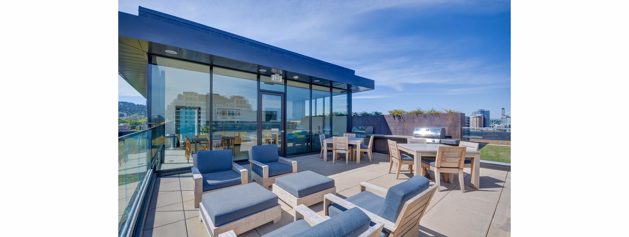 Rooftop deck with city view at mResidences Portland Pearl District Apartments, perfect for relaxation and gatherings
