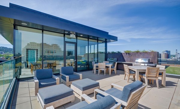 Rooftop deck with city view at mResidences Portland Pearl District Apartments, perfect for relaxation and gatherings