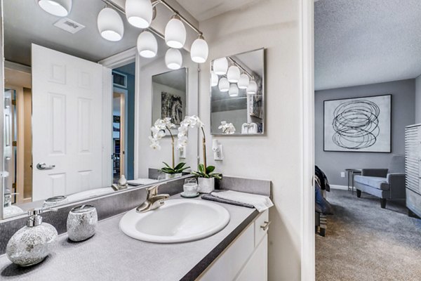 Bathroom with modern fixtures and sleek design at Loretto Heights Apartments, a Greystar luxury property in Denver