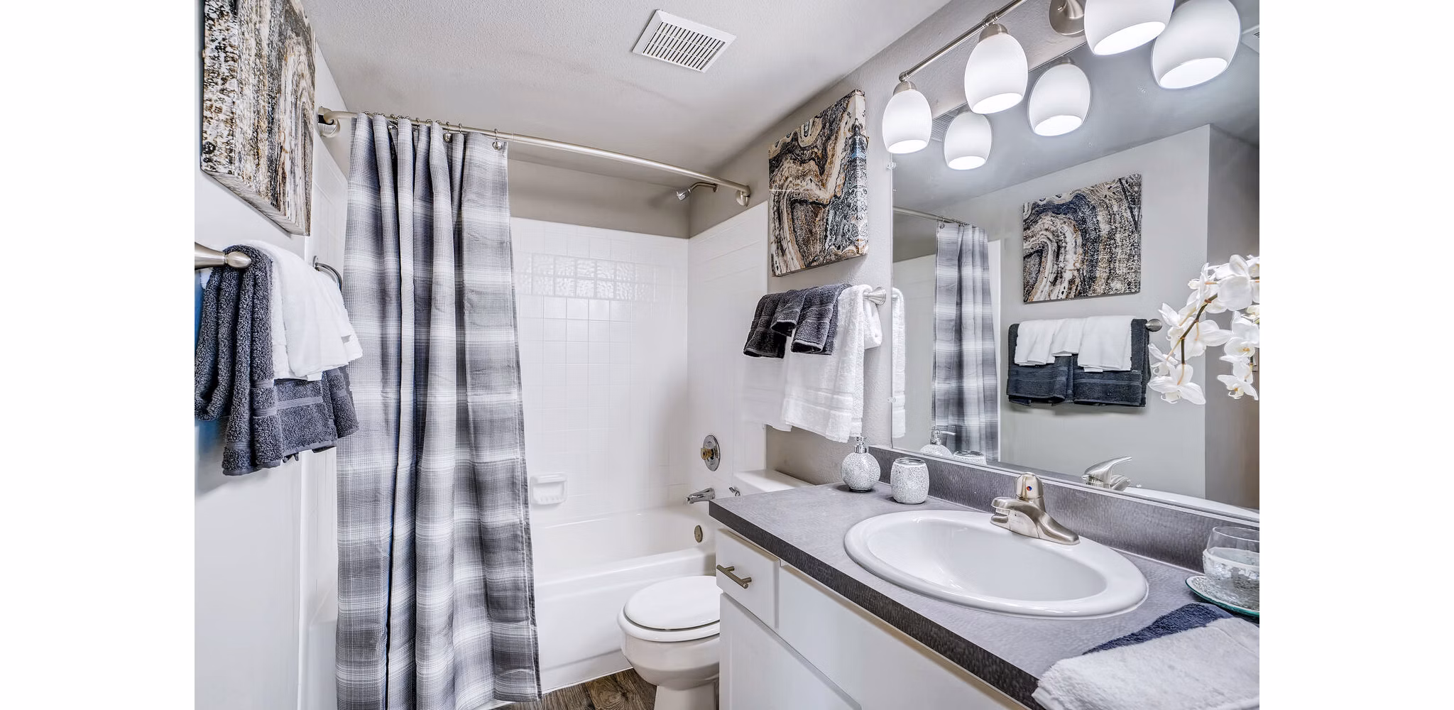 Loretto Heights Apartments: Elegant bathroom with modern fixtures in luxury community