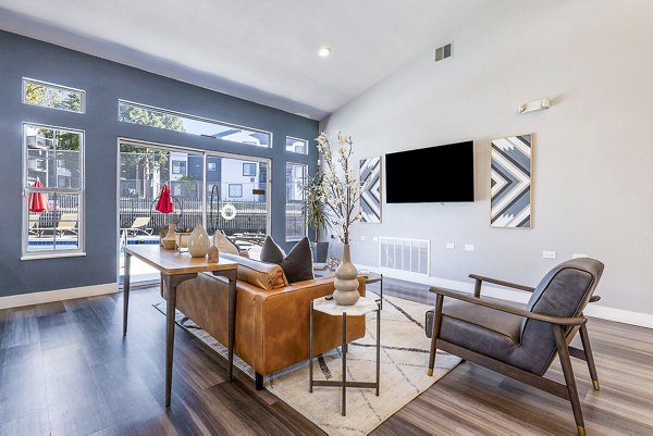 Clubhouse featuring modern design and comfortable seating at Loretto Heights Apartments