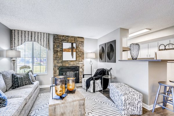 Spacious living room with modern decor and large windows at Loretto Heights Apartments, luxury rentals by Greystar
