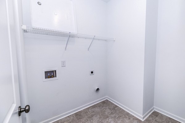 laundry room hookups at Overlook at Kennerly Lake Apartments