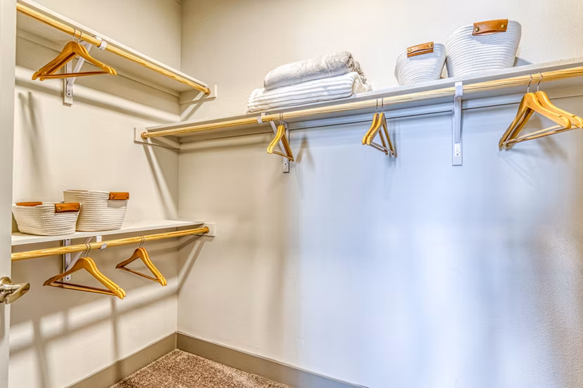 Bedroom closet with custom shelving at The Banks of Springdale Apartments