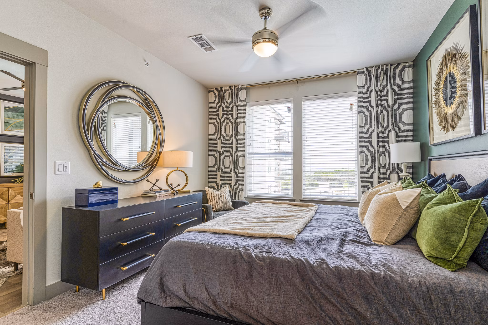 Cozy bedroom with stylish decor at The Banks of Springdale Apartments