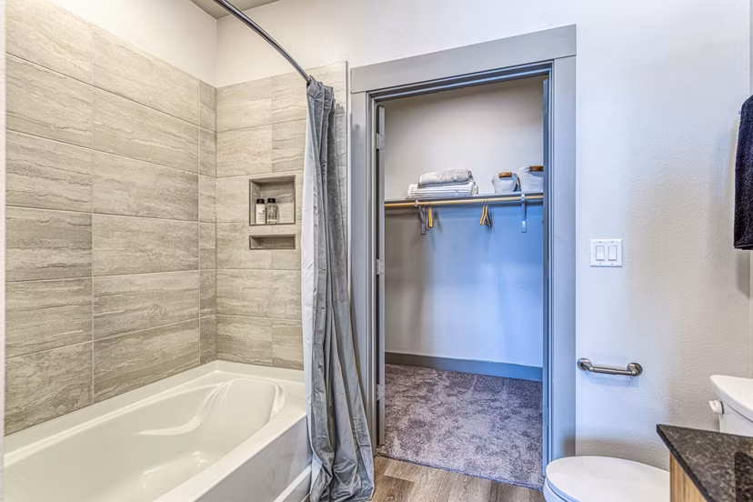 Luxurious bathroom with modern fixtures at The Banks of Springdale Apartments
