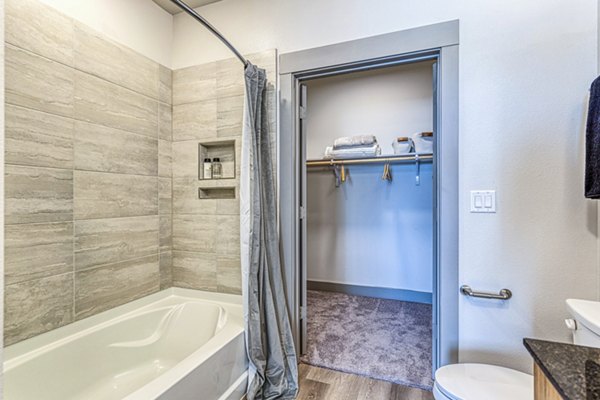 Luxurious bathroom with modern fixtures at The Banks of Springdale Apartments