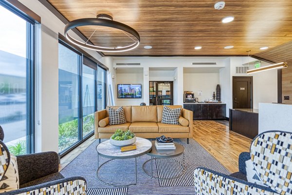 Clubhouse and leasing office at The Banks of Springdale Apartments with luxury amenities and stylish design