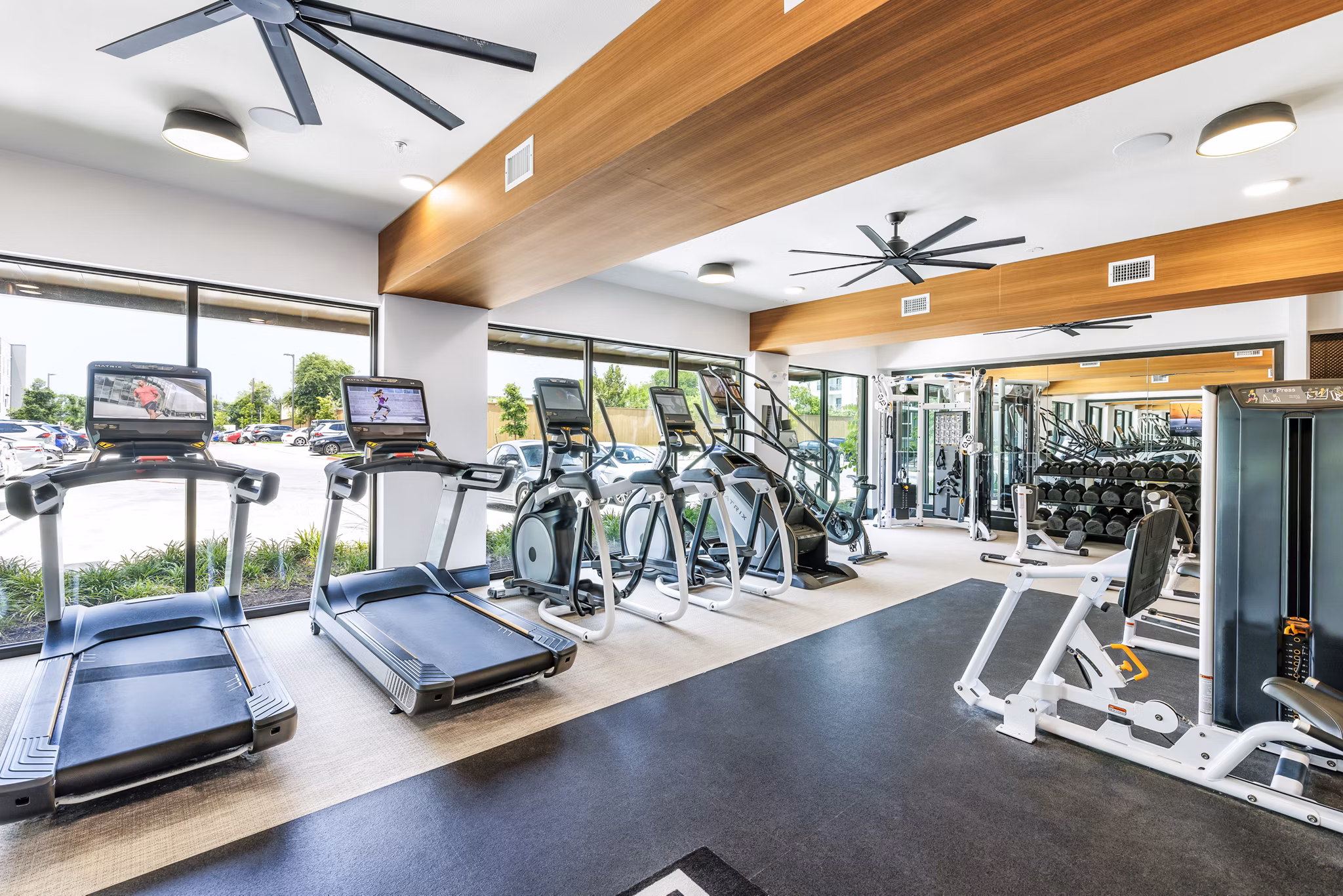 State-of-the-art fitness center with modern equipment at The Banks of Springdale Apartments