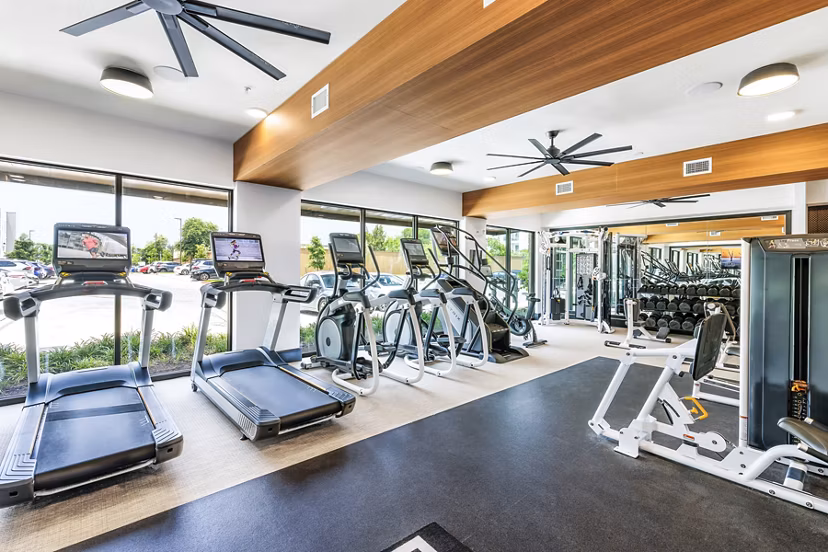 State-of-the-art fitness center with modern equipment at The Banks of Springdale Apartments