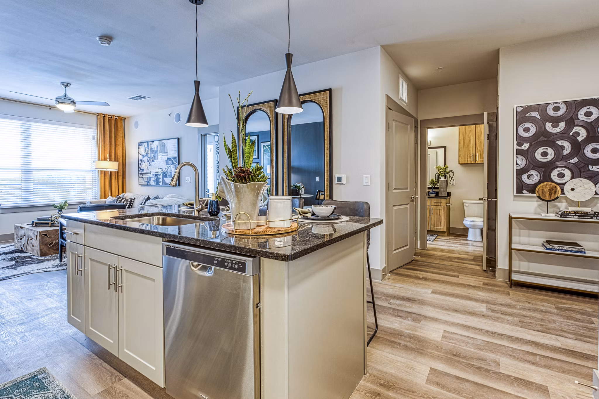 Modern kitchen with stainless steel appliances at The Banks of Springdale Apartments